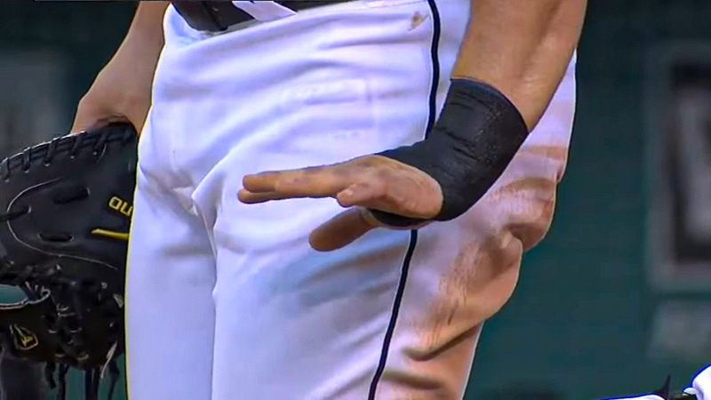 Baseball Players Tape Their Wrists