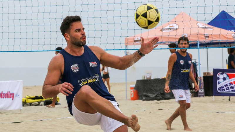 Kick The Ball Over The Net In Volleyball