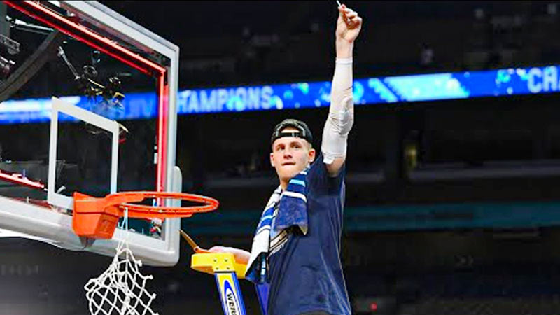 Basketball Players Cut the Net