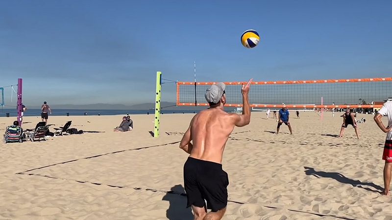 Can you set over in beach volleyball?