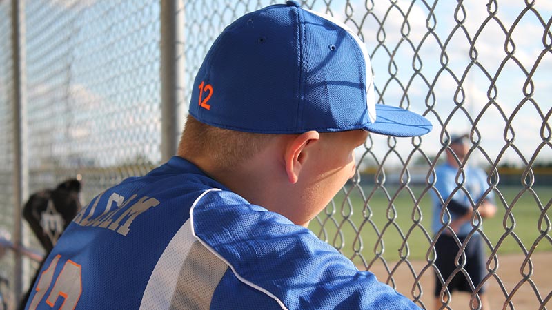 Find A baseball cap that fits snugly around your ears