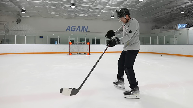 Do NHL players tape their own sticks?