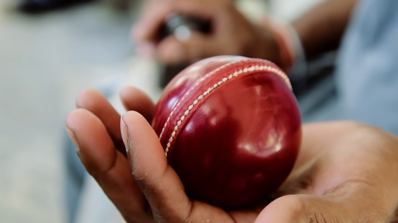 Is a cricket ball harder than a baseball?