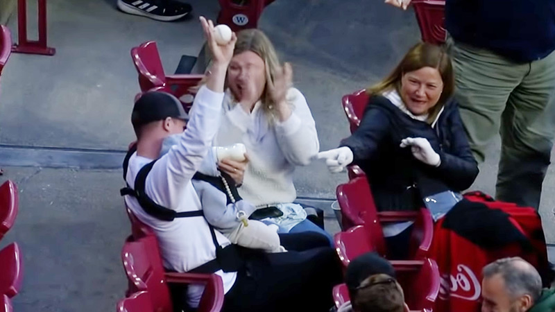 What happens if a fan catches a foul ball?