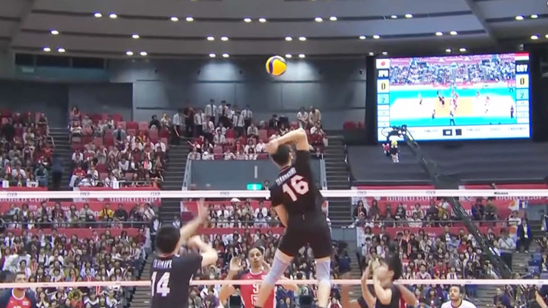 setters jump to set the ball