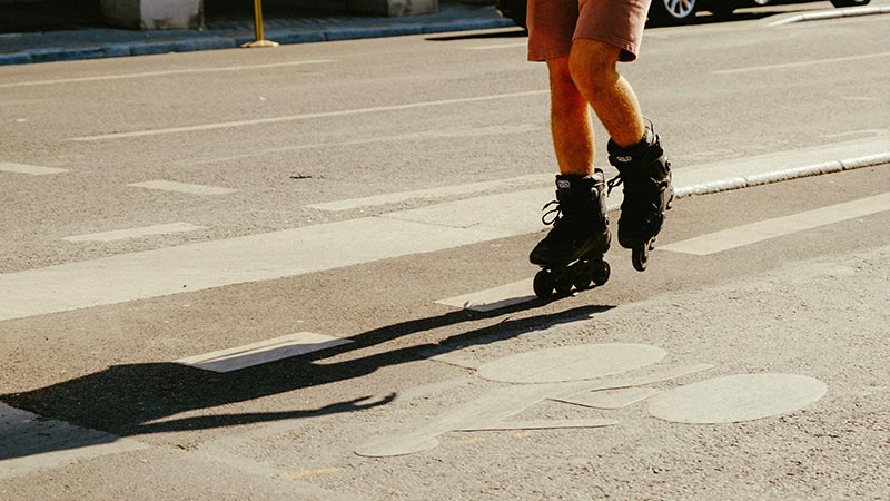 How stop while going downhill in rollerblades?