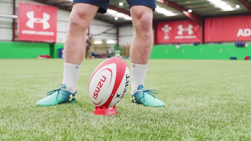 Is a rugby ball bigger than a football?