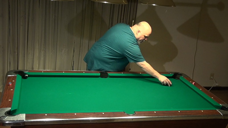 Where do you place the cue ball after a scratch in pool?