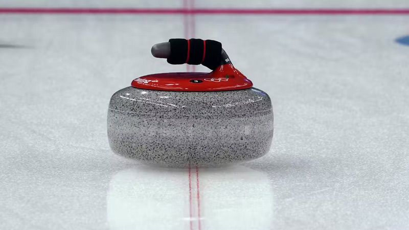 Do you have to spin the stone in curling?
