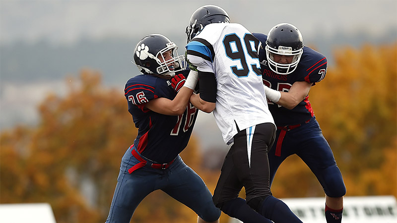 Is a nose tackle a defensive tackle?