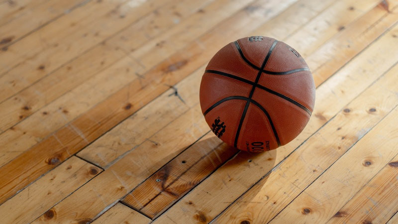 air up a basketball with a hand pump