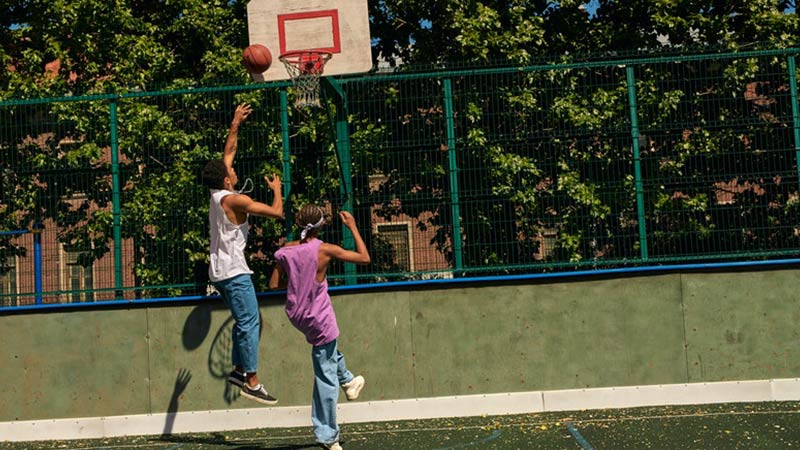 Two Mexicans Playing Basketball