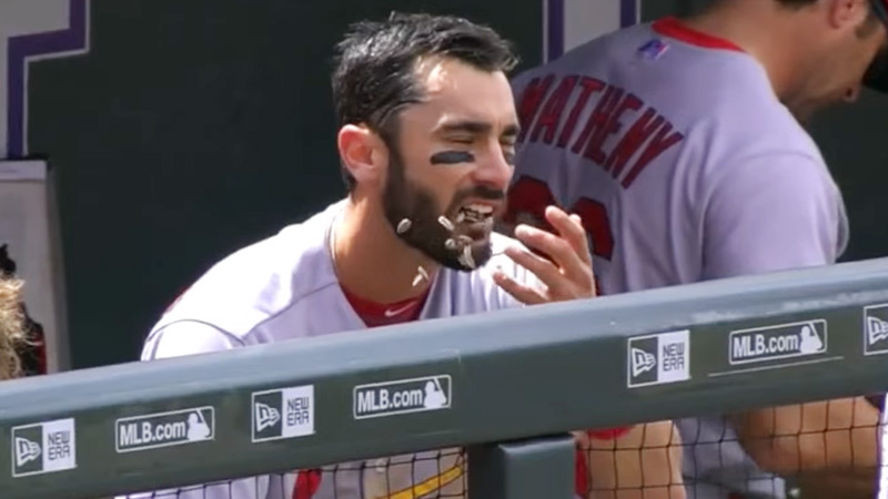 Baseball Players Eat Sunflower Seeds