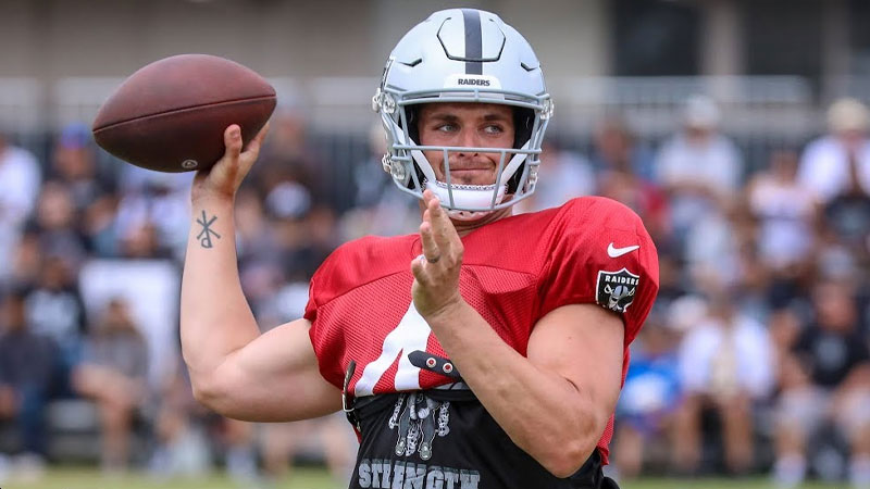 Derek Carr Tape Over His Ear Holes