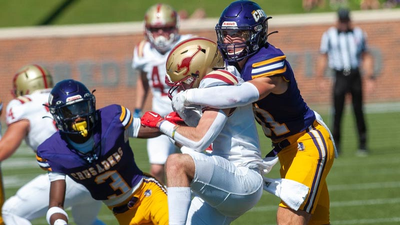 Football Down By Contact in NFL and NCAA