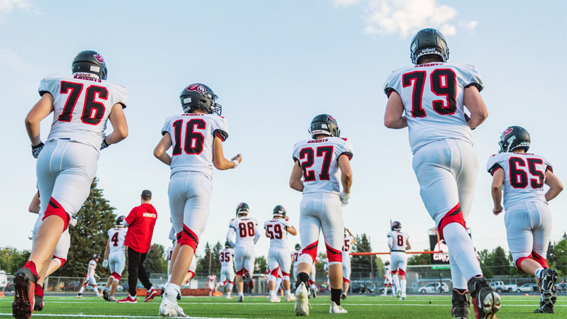The Evolution of Team Sizes in American Football