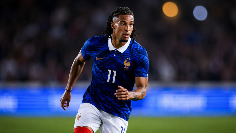why does olise play for france